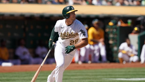 Sep 11, 2021; Oakland, California, USA; Oakland Athletics first baseman Matt Olson (28) hits a home run during the third inning against the Texas Rangers at RingCentral Coliseum. Mandatory Credit: Darren Yamashita-USA TODAY Sports